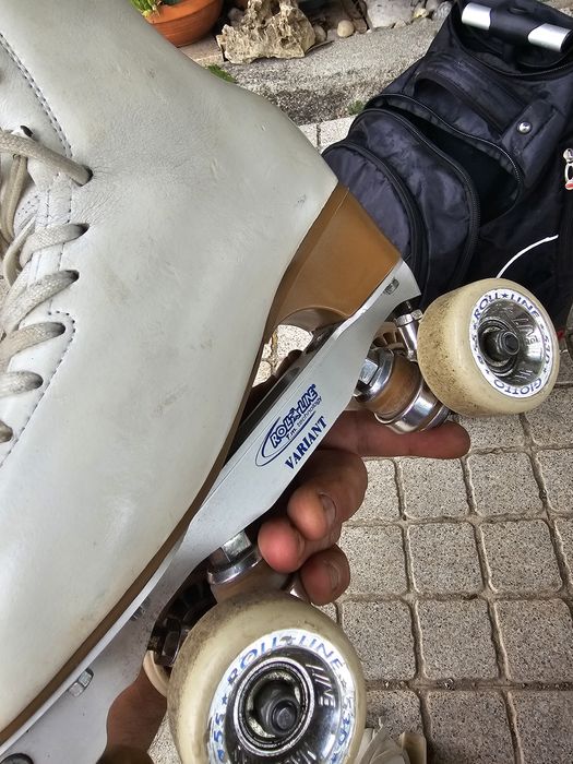 Patins de p. Artística mais mochila