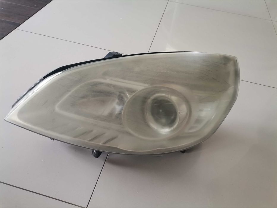 Reflektor lewy Renault Scenic II LIFT soczewska 0E