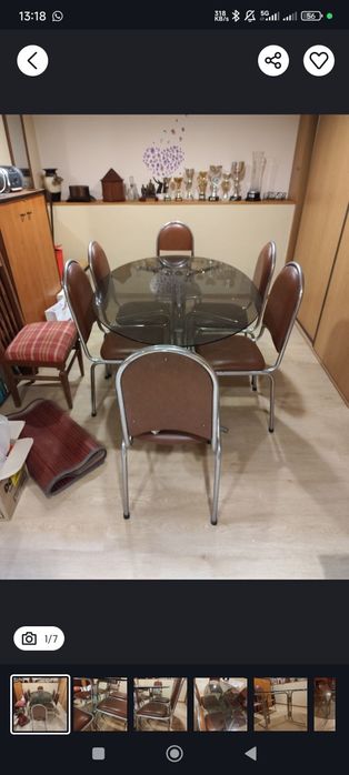 Mesa de vidro oval e 6 cadeiras