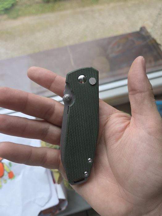 CRKT squid XM button lock