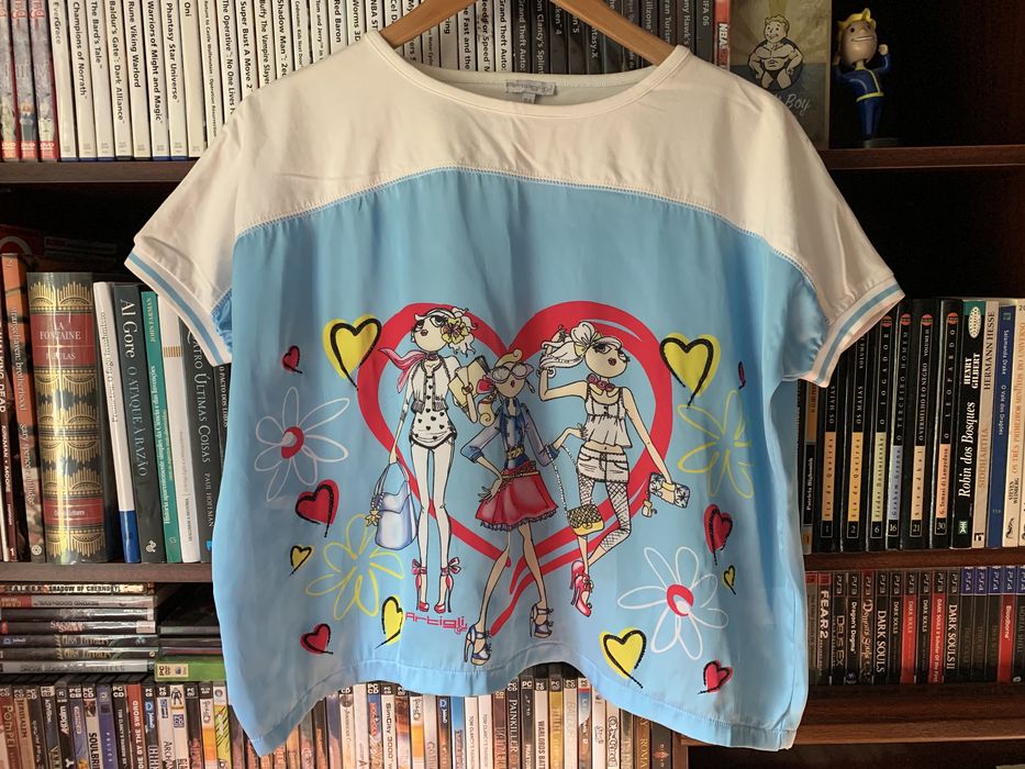 Blusa, tamanho L [medidas na descrição]