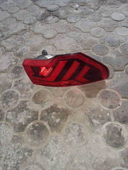 Продам задній фонар кузова лівий Ауді Q3 оригінал.