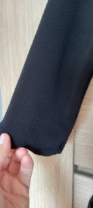 Sukienka z kieszeniami.