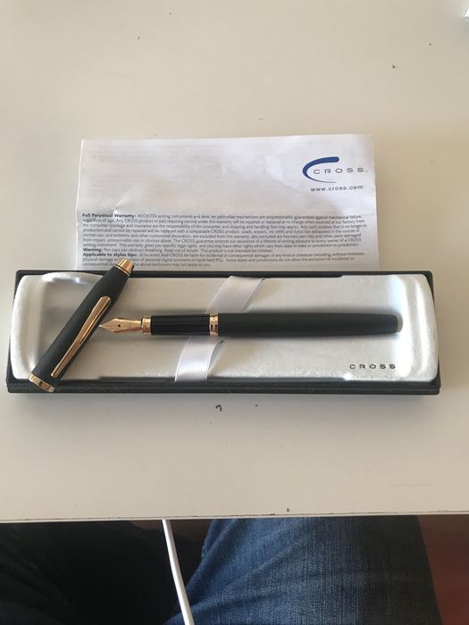 Caneta Cross dourada e lacre de tinta permanente
