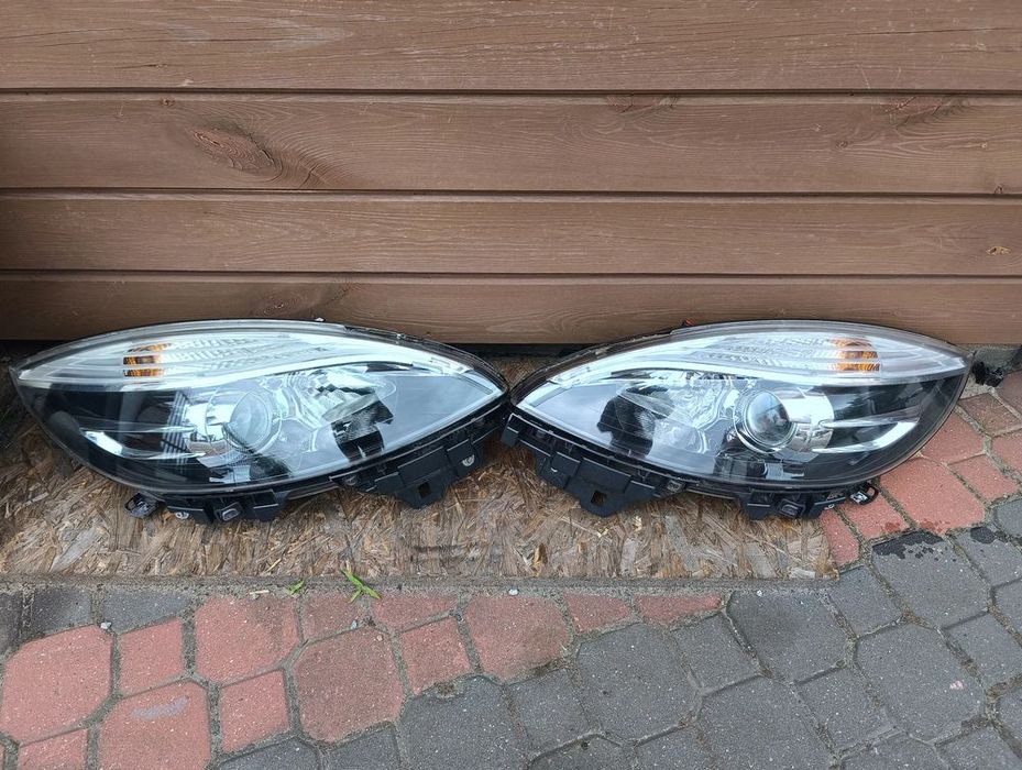 lampa przód przednia prawa lewa renault scenic 3 iii lift soczewka 260106928r lewa