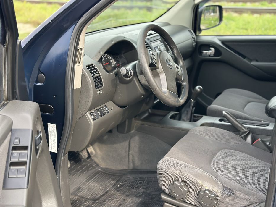 Nissan Navara 2009 год • 2.5 дизель
