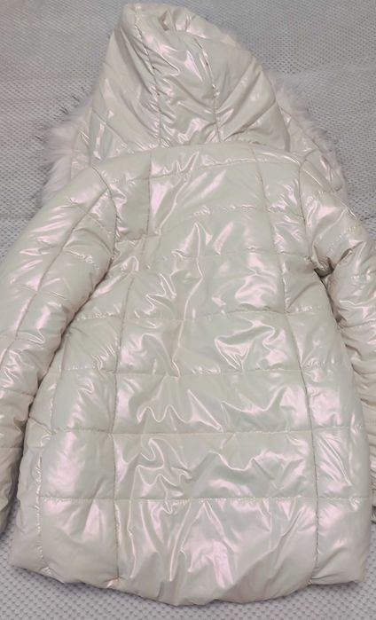 Пуховик на зріст 140