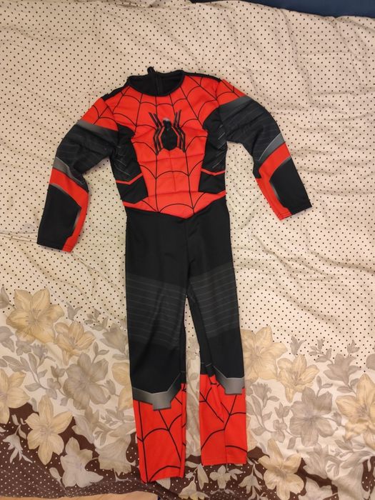 Kurtki i bluzy dla chłopca 122/128