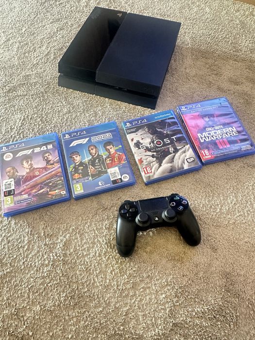 Ps4 com comando e 4 jogos