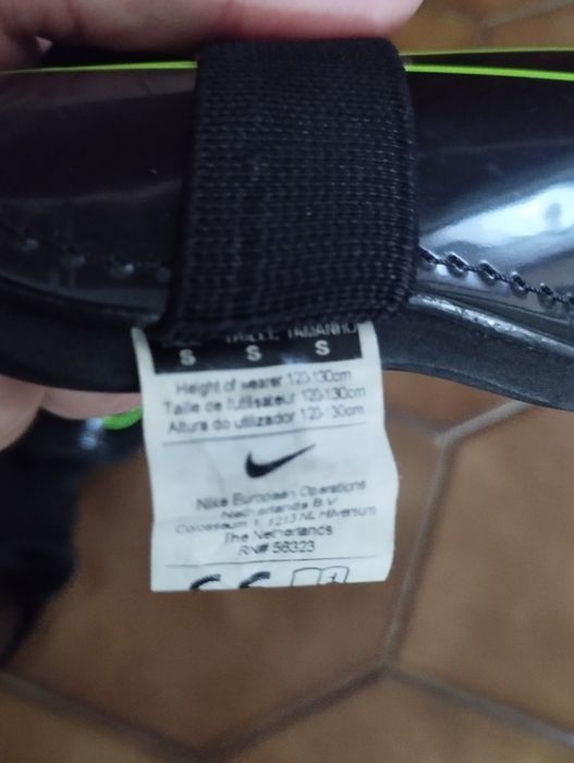 Caneleiras de futebol de criança da Nike