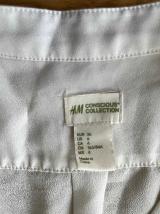 Biała koszulka bez rękawów H&M