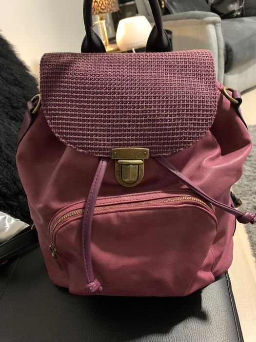 Mochila pequena roxa