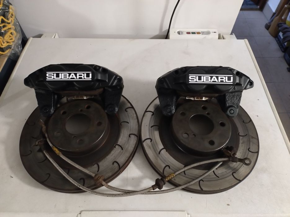 Zaciski 4-tłoczkowe Subaru Impreza WRX Forester Tarcze Klocki Oplot