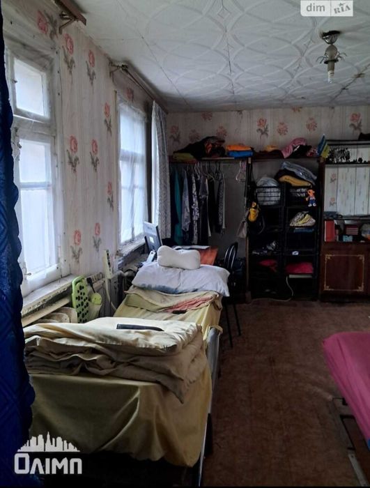 Продам пів будинку в топовом місці на вул.Кармелюка 0962