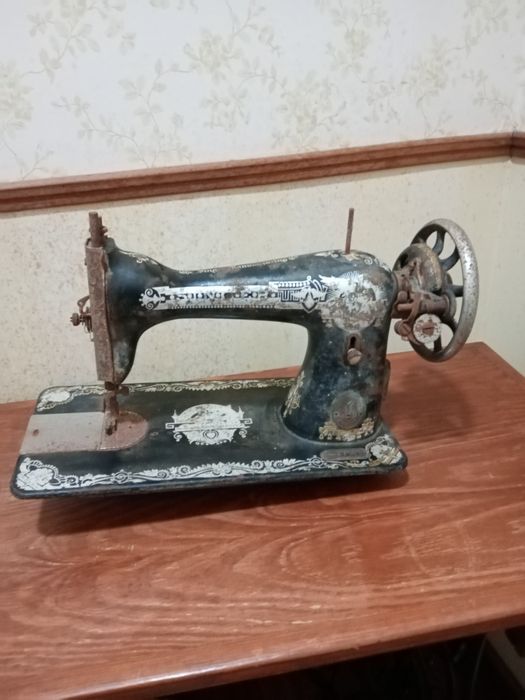 Máquina de costura singer