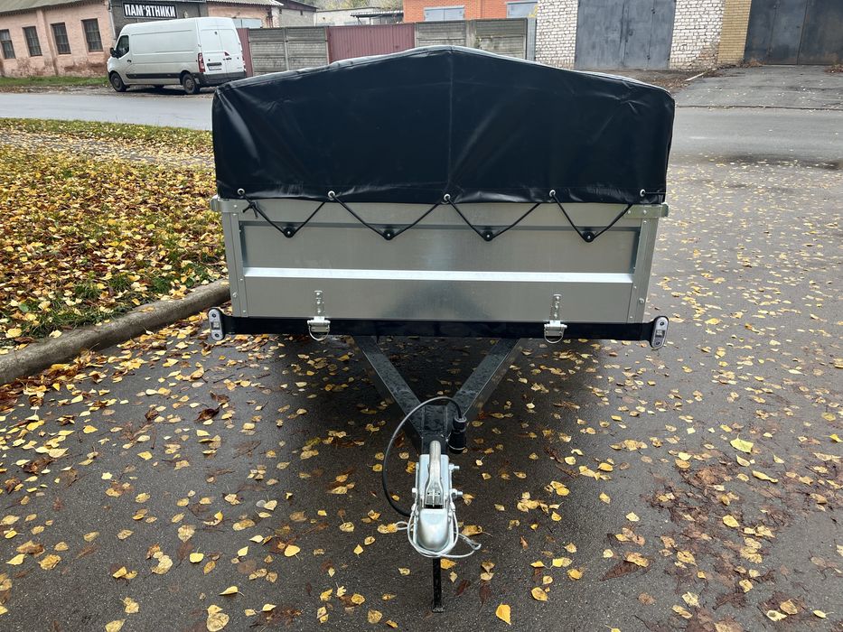 Причіп розміром 2.56 м Х 1.31 м Х 45 см
