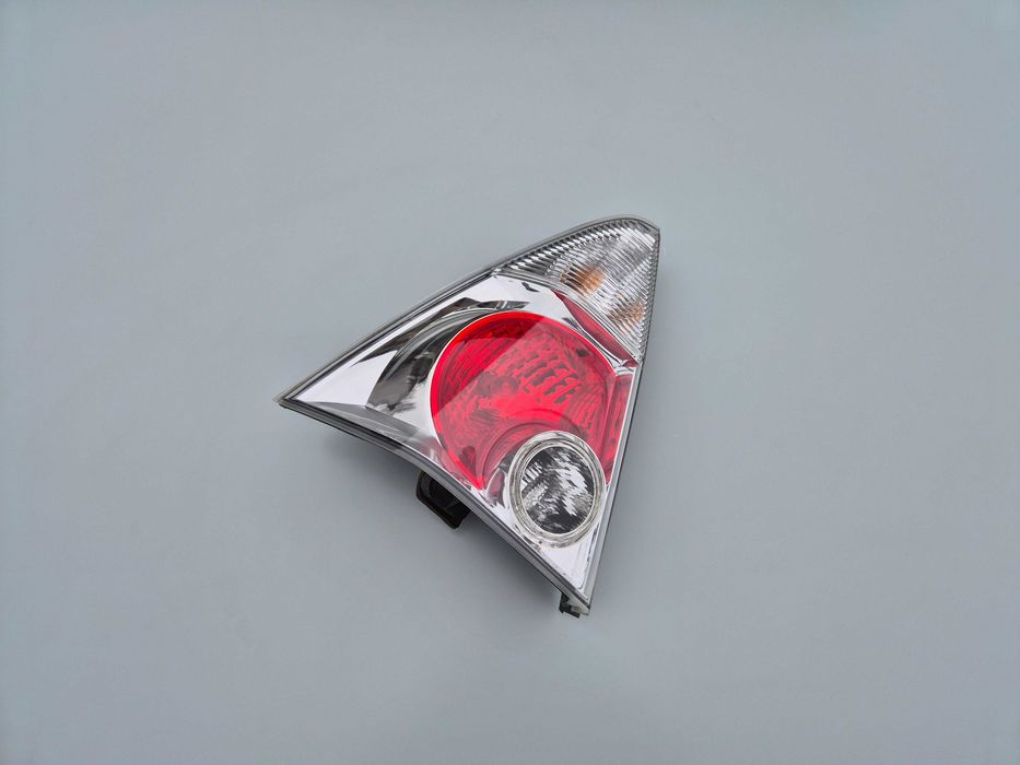 Lewa Tylna Tył Lampa Reflektor Daihatsu YRV Kompletna Europa Oryginał