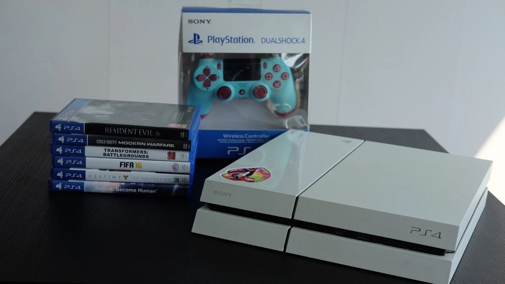Sony PlayStation 4 Branca com Comando Novo e 6 Jogos