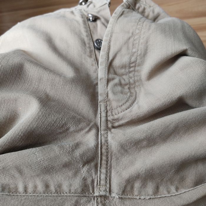 Spodnie męskie w kolorze beżowym