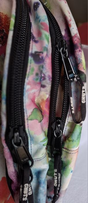 Mochila GUTS como nova