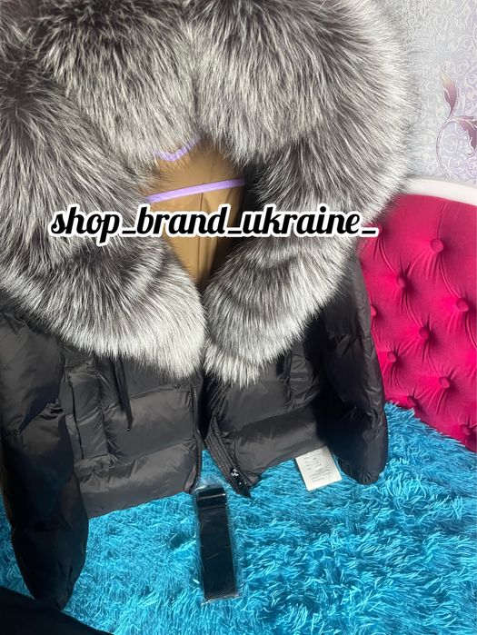 Розпродаж пуховиків з натуральним хутром