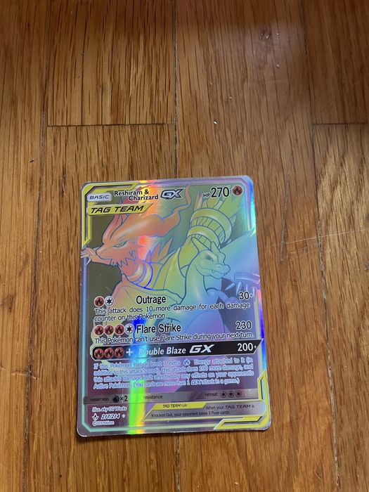 Carta Pokémon Reshiram & Charizard GX Rainbow Rare 217/214 – Unbroken Bonds