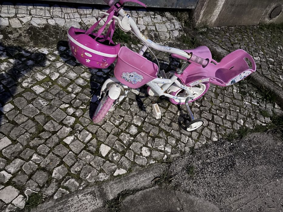Vende se bicicleta ora crianca usada e bom estado . Dos 2 aos 4 anos d
