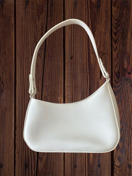 Біла сумка багет