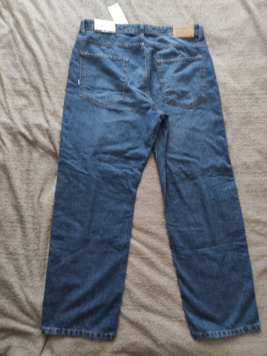 Джинси relaxed від бренду Cropp