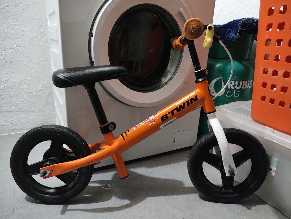 Bicicleta sem pedais criança 10 polegadas RUNRIDE 500 B'TWIN Laranja