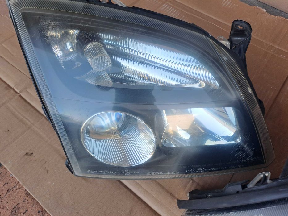 Lampy przód Opel Vectra c