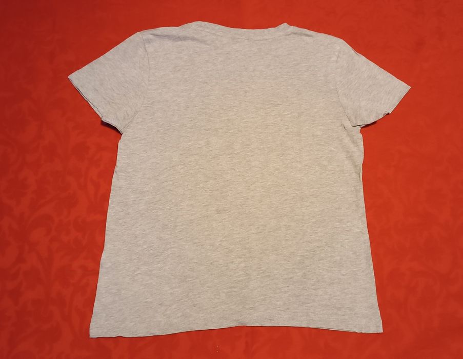 T-shirt cinzenta. Nerft. 10 Anos. Nova sem etiqueta