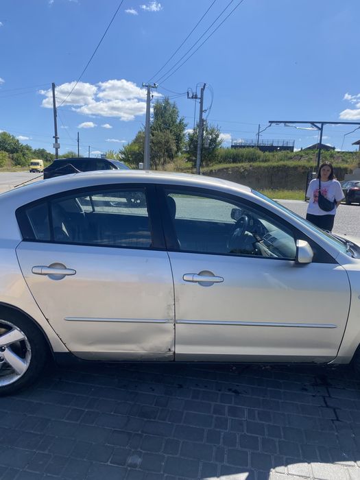 Mazda  3.   2004