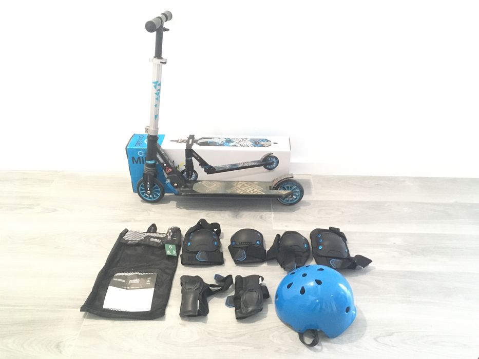 Trotinete com equipamento proteção