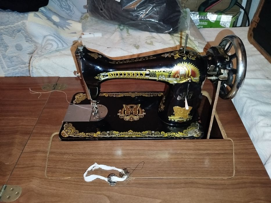 Máquina de costura butterfly