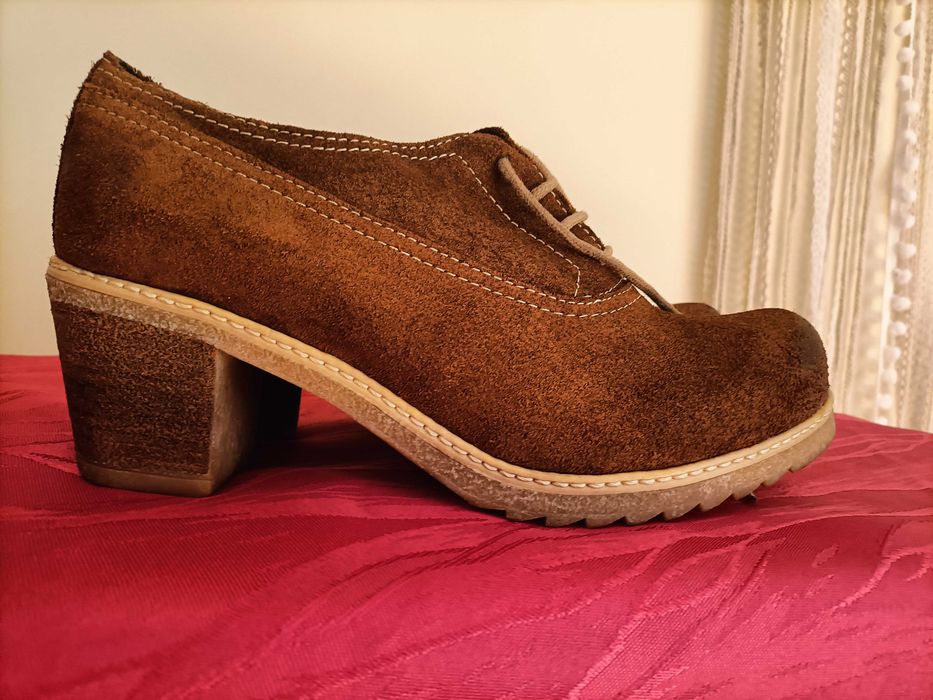 Botins castanhos em ótimo estado