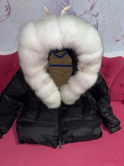 Розпродаж пуховиків з натуральним хутром
