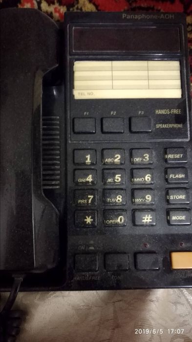 Стационарный телефон определителем номера и радиоудлинителем