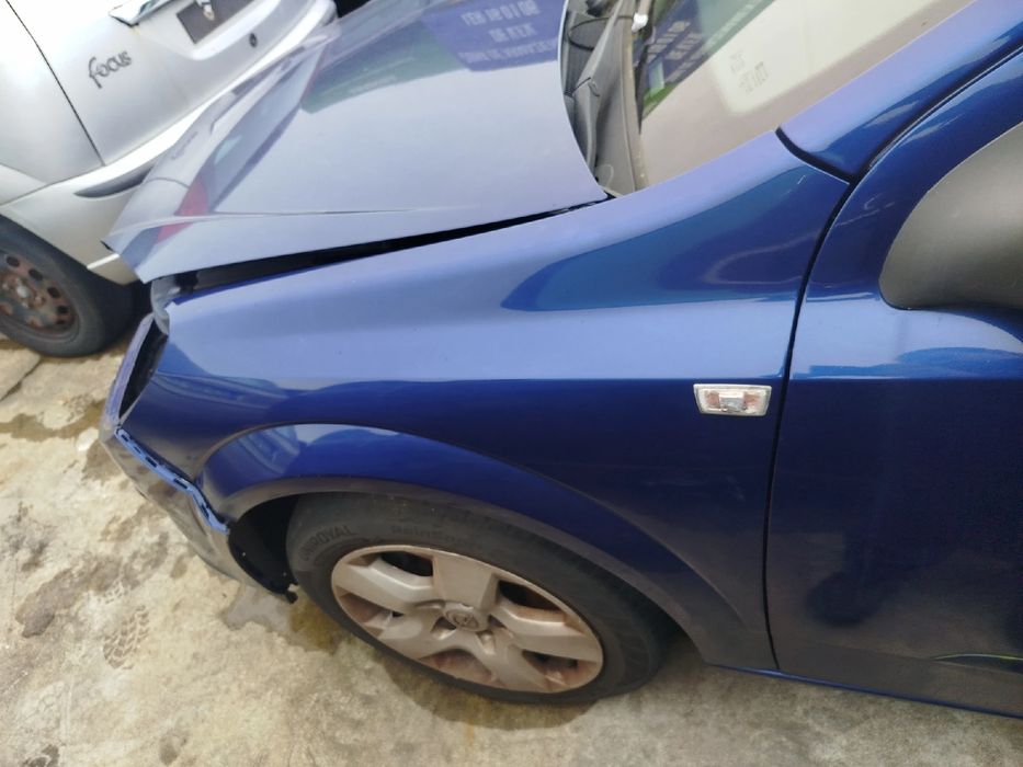 Guarda-lamas esquerdo OPEL Astra H Hatchback (L48)
