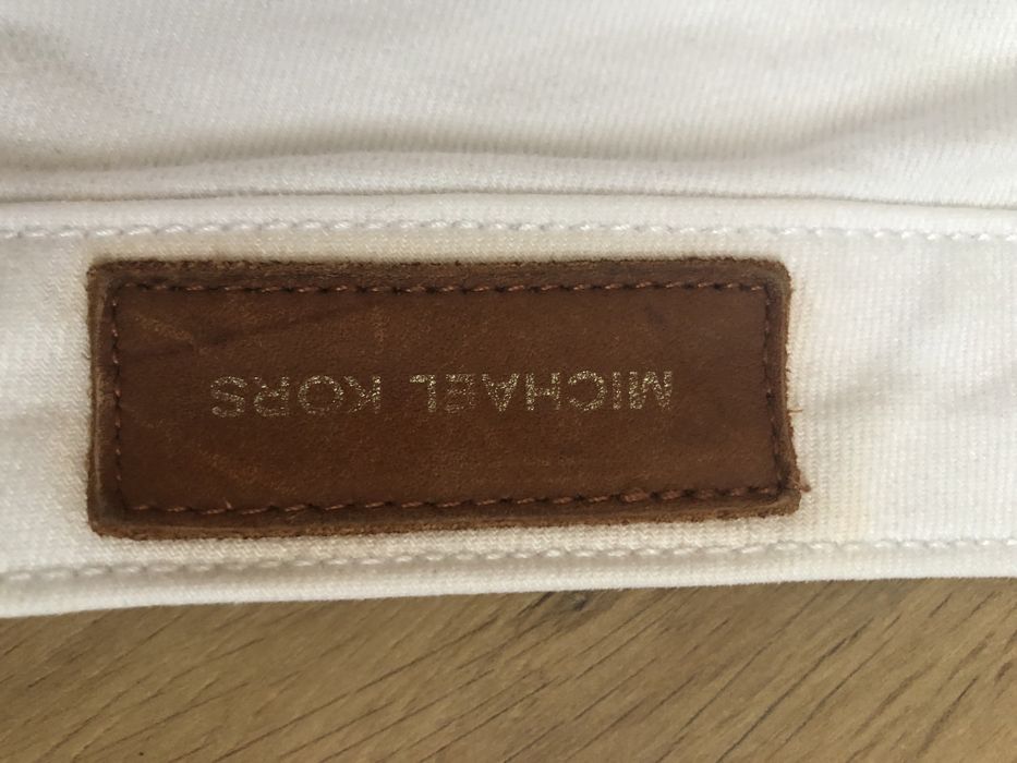 Białe spodnie jeansowe damskie Michael Kors 8/29