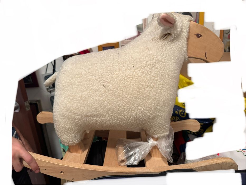 Ovelha com pés de baloiço