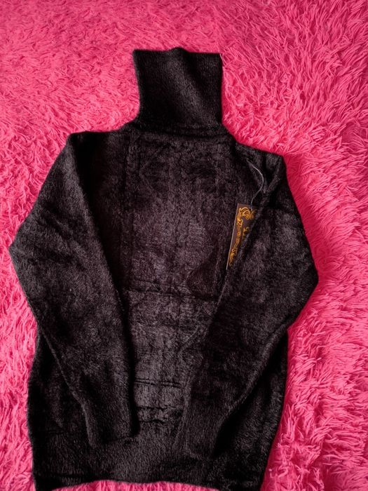 Кофтинка нова.Дуже тепла .Розмір 44- 46.