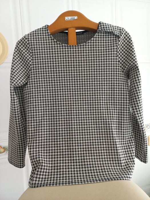Blusa em xadrez da SFERA Collection