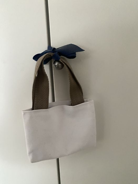 Mini saco proveniente da filadelfia