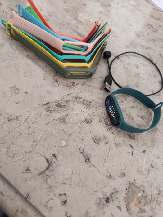 Relógio Xiaomi com várias braceletes