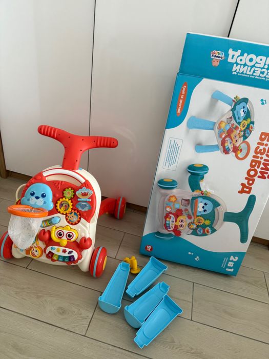 Дитячі ходунки каталка столик