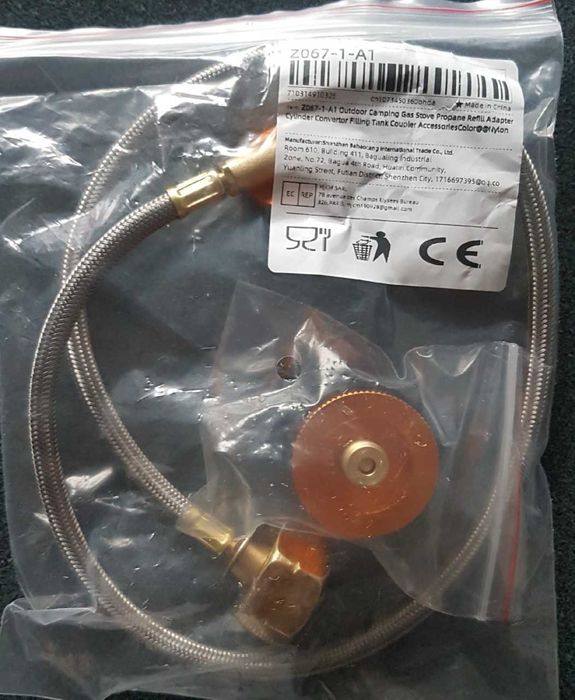 Kempingowy zestaw do napełniania butli gazowych.