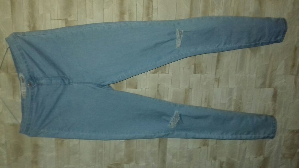 H&M spodnie rurki z dziurami 40