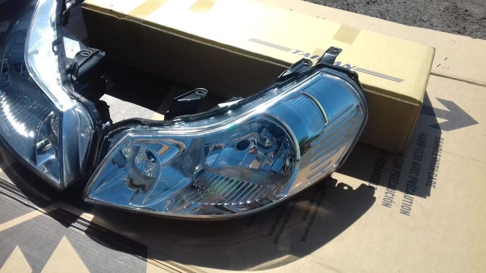 SUZUKI SX4 06 - lampa przednia lewa nowa