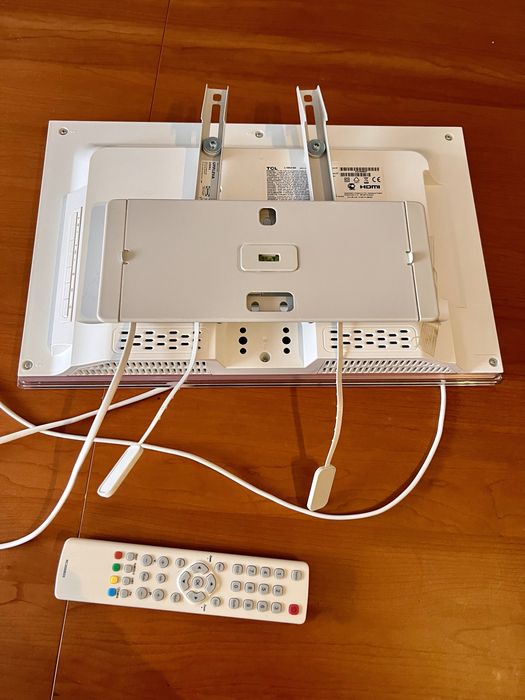 Televisao TCL rosa com comando + suporte parede64171282723074124